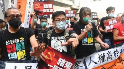 Hong Kong: ‘Anti-protest’ law kicks in as city marks handover