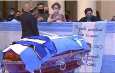 Maradona buried beside his parents