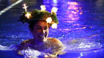 Estonians plunge into icy water to ward off coronavirus blues