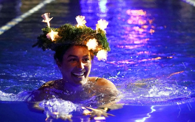 Estonians plunge into icy water to ward off coronavirus blues