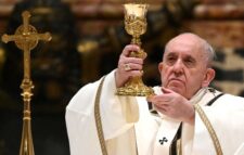 Pope urges help for poor at low-key Christmas Eve Mass curbed by COVID