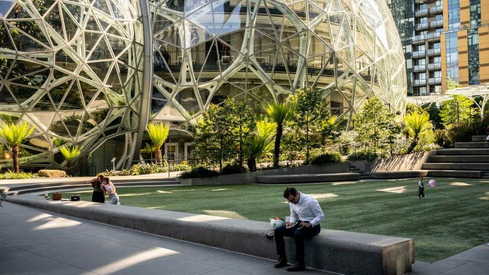 Amazon delays office return until 2022 as Covid spreads