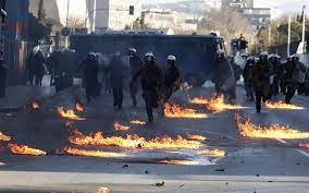 Police officer burned to death amid anti-govt unrest in Peru