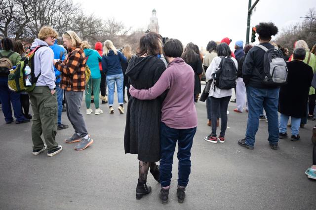 Suspect found dead in woods after Denver school shooting wounded 2 administrators